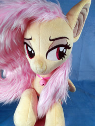 Size: 3120x4160 | Tagged: safe, artist:doctorkoda, derpibooru import, fluttershy, bat pony, pony, bat ponified, flutterbat, irl, photo, plushie, prone, race swap, solo