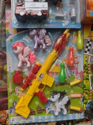 Size: 503x671 | Tagged: safe, derpibooru import, bootleg, bowling pin, irl, nerf gun, photo, pop, toy