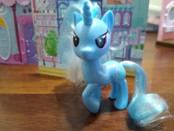 Size: 400x300 | Tagged: safe, derpibooru import, trixie, pony, unicorn, blue coat, female, horn, mare, photo, solo, toy, two toned mane