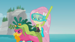 Size: 1920x1080 | Tagged: safe, derpibooru import, screencap, fluttershy, better together, equestria girls, unsolved selfie mysteries, beach, clothes, diving goggles, diving suit, geode of fauna, magical geodes, snorkel, solo, swimsuit, wet, wet hair, wetsuit