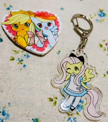 Size: 1814x2048 | Tagged: safe, artist:rai_ra, derpibooru import, applejack, fluttershy, rainbow dash, appledash, female, handmade, irl, japan ponycon, keychain, lesbian, photo, pin, shipping