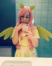 Size: 1014x1268 | Tagged: safe, derpibooru import, fluttershy, human, cellphone, clothes, cosplay, costume, cutie mark, cutie mark on clothes, female, irl, irl human, mirror, phone, photo, reflection, selfie, smartphone, spread wings, wings