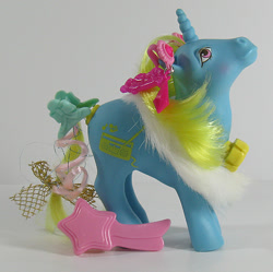 Size: 602x600 | Tagged: safe, photographer:breyer600, g1, barrette, bow, brush, dance 'n prance pony, dj (g1), ear piercing, earring, feather boa, jewelry, piercing, tail bow, toy