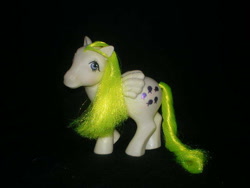 Size: 640x480 | Tagged: safe, derpibooru import, photographer:breyer600, photographer:lancer, surprise, pegasus, pony, g1, black background, female, mare, simple background, smiling, toy