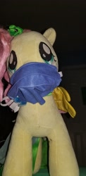 Size: 1960x4032 | Tagged: safe, derpibooru import, photographer:joeydr, fluttershy, pegasus, pony, build-a-bear, clothes, coronavirus, covid-19, dress, face mask, female, gala dress, irl, mare, photo, plushie, solo