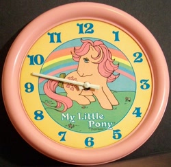 Size: 800x779 | Tagged: safe, photographer:ravenwolf, peachy, g1, bow, clock, merchandise, tail bow