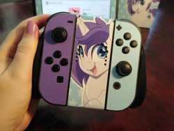 Size: 2048x1536 | Tagged: safe, artist:partylikeanartist, oc, oc only, oc:indigo wire, pony, unicorn, irl, looking at you, nintendo, nintendo switch, photo, solo, switch, wingding eyes