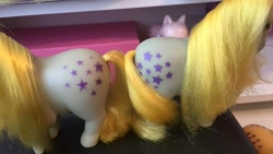 Size: 853x480 | Tagged: safe, blue belle, g1, cielete, comparison, cutie mark, irl, photo, piggy pony, solo, spain, spanish, toy, variant