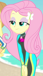 Size: 460x814 | Tagged: safe, screencap, applejack, fluttershy, butterfly, better together, equestria girls, forgotten friendship, beach, bodysuit, clothes, cloud, cropped, cute, female, geode of fauna, hairclip, hands together, jewelry, lidded eyes, long sleeves, magical geodes, necklace, ocean, sand, shyabetes, smiling, swimsuit, wetsuit