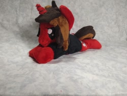 Size: 1032x774 | Tagged: safe, artist:bluedragonflyplush, derpibooru import, pony, unicorn, all time low, beanie (plushie), clothes, commission, horn, irl, jack barakat, male, photo, plushie, ponified, prone, shirt, smiling, smirk, solo, stallion, t-shirt