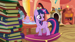 Size: 1280x720 | Tagged: safe, derpibooru import, screencap, twilight sparkle, unicorn twilight, pony, unicorn, spike at your service, book, cup, female, golden oaks library, pillow, raised hoof, solo, teapot