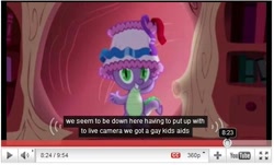 Size: 506x305 | Tagged: safe, derpibooru import, edit, edited screencap, screencap, spike, dragon, friendship is magic, aids, caption, gay, hat, hiv, lampshade, lampshade hat, male, solo, youtube, youtube caption