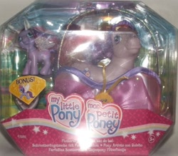 Size: 670x587 | Tagged: safe, derpibooru import, photographer:collector1, fluttershy (g3), breezie, g3, french, hilarious in hindsight, lady slipper, packaging, spanish, toy