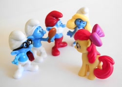 Size: 1024x726 | Tagged: safe, derpibooru import, apple bloom, blind bag, brainy smurf, figure, irl, papa smurf, photo, smurfette, smurfs, toy, vanity smurf, wrong neighborhood