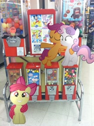 Size: 1936x2592 | Tagged: safe, derpibooru import, apple bloom, scootaloo, sweetie belle, candy machines, irl, photo, ponies in real life, store