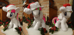 Size: 1024x496 | Tagged: safe, artist:skippymagrue, derpibooru import, blossomforth, pegasus, pony, christmas, female, hat, holiday, irl, mare, photo, plushie, santa hat, solo