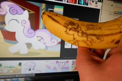 Size: 1306x875 | Tagged: safe, artist:7yashka7, artist:synch-anon, derpibooru import, sweetie belle, banana, food art, irl, photo, tattoo