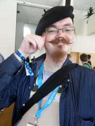 Size: 3456x4608 | Tagged: safe, artist:juu50x, derpibooru import, human, 2014, barely pony related, crystal fair con, evil, finland, finlandia hall, glasses, hat, helsinki, irl, irl human, moustache, photo, swang, the stache