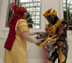 Size: 800x705 | Tagged: safe, apple bloom, human, bumblebee, cosplay, dancing, irl, irl human, katsucon, photo, transformers