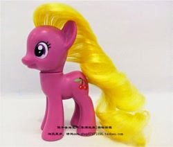 Size: 600x509 | Tagged: safe, derpibooru import, cherry berry, earth pony, pony, background pony, brushable, irl, photo, solo, taobao, toy