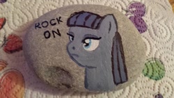 Size: 900x506 | Tagged: safe, artist:werepuppy, derpibooru import, maud pie, photo, rock, rock on, solo