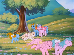 Size: 718x540 | Tagged: safe, screencap, baby half note, baby lofty, baby ribbon, baby tiddlywinks, buttons (g1), ribbon (g1), g1, my little pony 'n friends, flower, hill, laughing, meadow, playing, running, tree