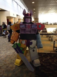 Size: 540x720 | Tagged: safe, artist:whiteboygus, human, 2014, bronycon, combiner, convention, cosplay, irl, irl human, megazord, photo, sword, transformers, weapon