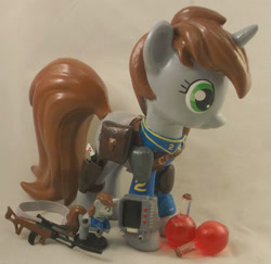 Size: 2993x2905 | Tagged: safe, artist:gryphyn-bloodheart, oc, oc only, oc:littlepip, pony, unicorn, fallout equestria, 3d print, brushable, custom, fanfic, female, gun, handgun, healing potion, health potion, irl, little macintosh, mare, photo, pipbuck, potion, revolver, saddle bag, solo, statuette, toy, vault suit, weapon, zebra rifle