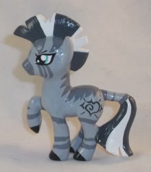 Size: 1705x1937 | Tagged: safe, artist:gryphyn-bloodheart, oc, oc only, oc:xenith, zebra, fallout equestria, blind bag, custom, fanfic, female, irl, mare, photo, raised hoof, solo, toy, zebra oc