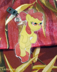 Size: 472x600 | Tagged: safe, artist:lobitaworks, apple bloom, badge, con badge, hanging, irl, merchandise, photo, unamused