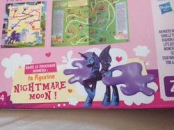 Size: 800x598 | Tagged: safe, nightmare moon, alicorn, pony, black coat, female, horn, magazine, mare, solo, toy, wings