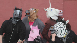 Size: 1920x1080 | Tagged: safe, screencap, horse, human, unicorn, slice of life (episode), 100th episode, brony, bronybait, easter egg, freeze frame bonus, hoers, hoers mask, horse mask group shot, irl, irl human, ishi rudell, jayson thiessen, jim miller, katrina hadley, live action, mask, photo, random, real, shit just got real, slowpoke, tim packford, timothy packford, wat, we know, weird