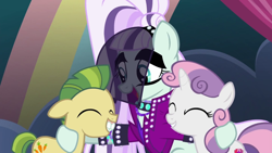 Size: 1600x900 | Tagged: safe, screencap, carrot crunch, coloratura, sweetie belle, earth pony, pony, unicorn, the mane attraction, colt, countess coloratura, crunchabetes, cute, diasweetes, female, filly, hug, male, mare, open mouth, rarabetes, smiling