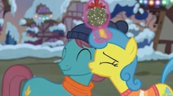 Size: 1672x933 | Tagged: safe, screencap, lemon hearts, a hearth's warming tail, autumn leaf, clothes, eyes closed, female, kiss on the cheek, kissing, lemonleaf, levitation, magic, male, mistletoe, scarf, shipping, shipping fuel, smiling, straight, telekinesis