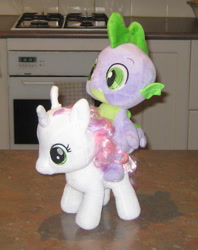 Size: 1189x1505 | Tagged: safe, artist:cheerbearsfan, spike, sweetie belle, dragon, pony, dragons riding ponies, female, irl, male, photo, plushie, riding, shipping, spikebelle, straight