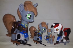 Size: 2293x1509 | Tagged: safe, artist:gryphyn-bloodheart, oc, oc only, oc:blackjack, oc:littlepip, pony, unicorn, fallout equestria, fallout equestria: project horizons, blind bag, clothes, custom, fanfic, female, funko, gun, handgun, hooves, horn, irl, little macintosh, mare, mystery mini, optical sight, photo, pipbuck, revolver, saddle bag, toy, vault suit, weapon