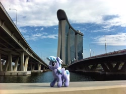 Size: 2592x1936 | Tagged: safe, artist:onlyfactory, derpibooru import, edit, cloudchaser, bootleg, irl, marina bay sands, photo, plushie, ponies around the world, singapore, solo