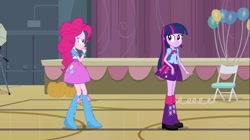 Size: 1100x618 | Tagged: safe, screencap, pinkie pie, twilight sparkle, equestria girls, equestria girls (movie), backpack, balloon, boots, bowtie, bracelet, camera, chair, clothes, doors, high heel boots, jewelry, leg warmers, pumpkin, raised leg, shoes, skirt