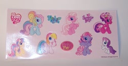 Size: 1191x613 | Tagged: safe, cheerilee (g3), pinkie pie (g3), rainbow dash (g3), scootaloo (g3), starsong, sweetie belle (g3), toola roola, pony, g3.5, core seven, irl, merchandise, photo, sticker