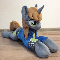 Size: 960x960 | Tagged: safe, artist:burgunzik, oc, oc only, oc:littlepip, pony, unicorn, fallout equestria, clothes, cutie mark, fanfic, fanfic art, female, hooves, horn, irl, lying down, mare, photo, pipbuck, plushie, prone, solo, vault suit