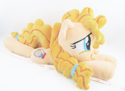 Size: 3587x2613 | Tagged: safe, artist:kazzysart, pear butter, pony, beanie (plushie), cute, high res, irl, pearabetes, photo, plushie, prone, solo