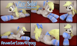 Size: 5141x3060 | Tagged: safe, artist:qtpony, derpibooru import, derpy hooves, pony, bow, clothes, hair bow, irl, life size, lying down, photo, plushie, prone, socks, solo, stockings, striped socks, tail bow