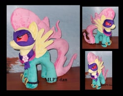 Size: 1024x803 | Tagged: safe, artist:calusariac, derpibooru import, fluttershy, saddle rager, pony, angry, irl, photo, plushie, power ponies, solo