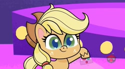 Size: 1667x927 | Tagged: safe, derpibooru import, screencap, applejack, earth pony, pony, my little pony: pony life, sportacular spectacular musical musak-ular, spoiler:pony life s01e46, breaking the fourth wall, cute, hoof hold, jackabetes, remote, solo