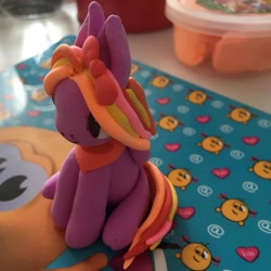 Size: 1080x1080 | Tagged: safe, artist:_alana_wolli_, derpibooru import, oc, oc only, earth pony, bow, craft, earth pony oc, hair bow, irl, photo, play doh, sculpture, sitting, solo, traditional art