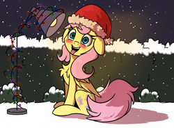 Size: 1597x1174 | Tagged: safe, artist:la hum, derpibooru import, fluttershy, pegasus, pony, blushing, chest fluff, christmas, christmas lights, ears, female, floppy ears, folded wings, hat, heat lamp, holiday, lamp, mare, open mouth, outdoors, santa hat, sitting, smiling, snow, solo, tongue out, wings, winter