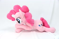 Size: 4096x2731 | Tagged: safe, artist:shunnkai, pinkie pie, earth pony, pony, crossed arms, female, irl, lying down, mare, photo, plushie, side view, smiling, solo