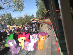 Size: 1032x774 | Tagged: safe, edit, editor:undeadponysoldier, photographer:undeadponysoldier, apple bloom, scootaloo, spike, sweetie belle, dragon, earth pony, human, pegasus, pony, unicorn, amusement park, amusement ride, cutie mark crusaders, dollywood, dragons in real life, edited photo, female, filly, irl, irl human, jaw drop, male, photo, pigeon forge, ponies in real life, queue, raised hoof, raised leg, standing on one leg, steam train, surprised, tennessee, train, train car, train station, unexpected