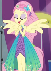 Size: 851x1179 | Tagged: safe, derpibooru import, screencap, fluttershy, better together, equestria girls, rollercoaster of friendship, cropped, female, microphone, ponied up, sleeveless, solo, spread wings, super ponied up, wings