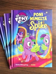 Size: 3024x4032 | Tagged: safe, artist:anthony conley, derpibooru import, photographer:anthony conley, spike, twilight sparkle, twilight sparkle (alicorn), alicorn, pegasus, pony, a pony named spike, book, book cover, colt, cover, female, finnish, happy, implied transformation, indoors, male, mare, mirror, my little pony logo, open mouth, open smile, photo, ponified, ponified spike, reflection, smiling, solo focus, species swap, stallion